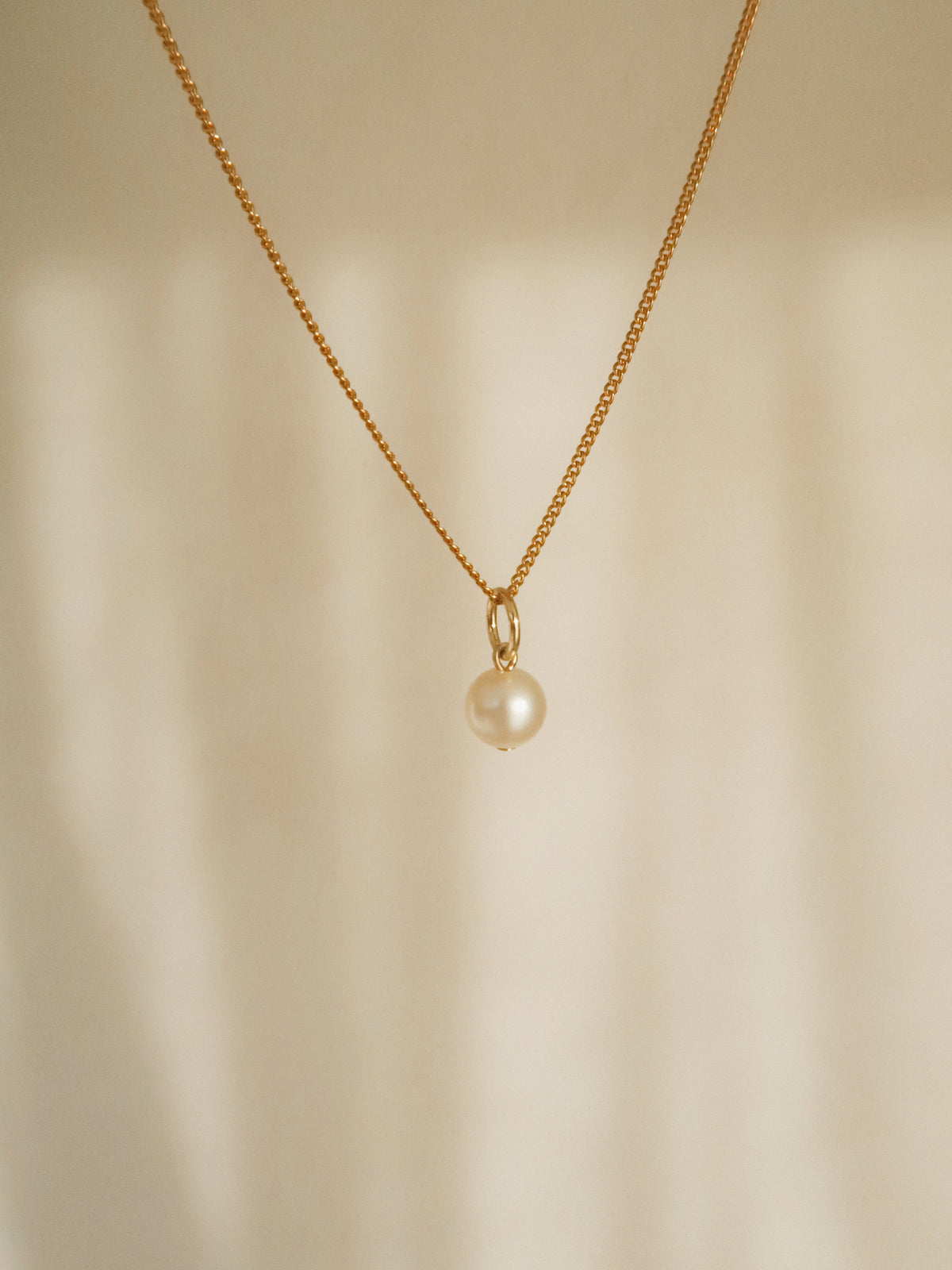 Small pearl charm